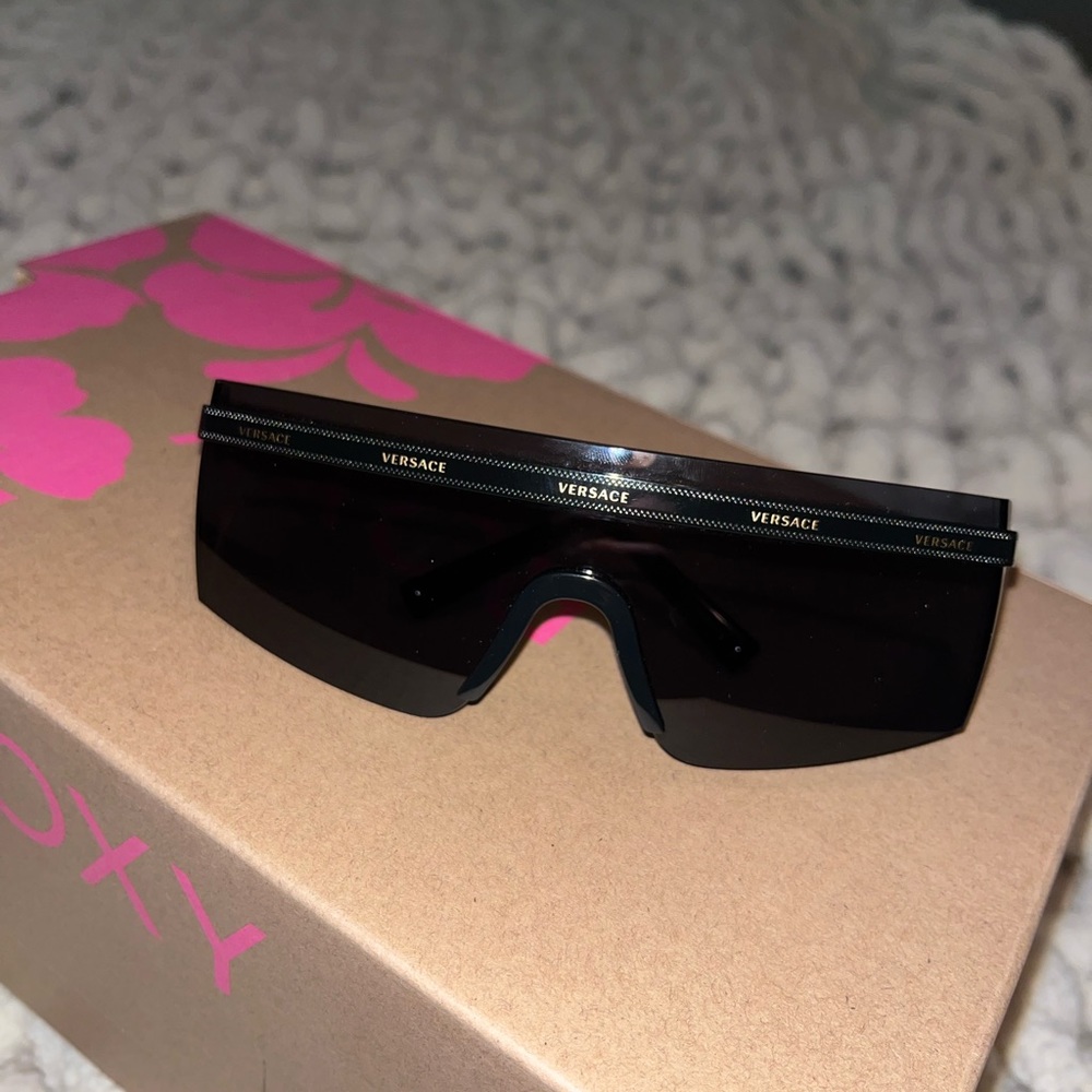 Versace Sunglasses. Brand new, never worn